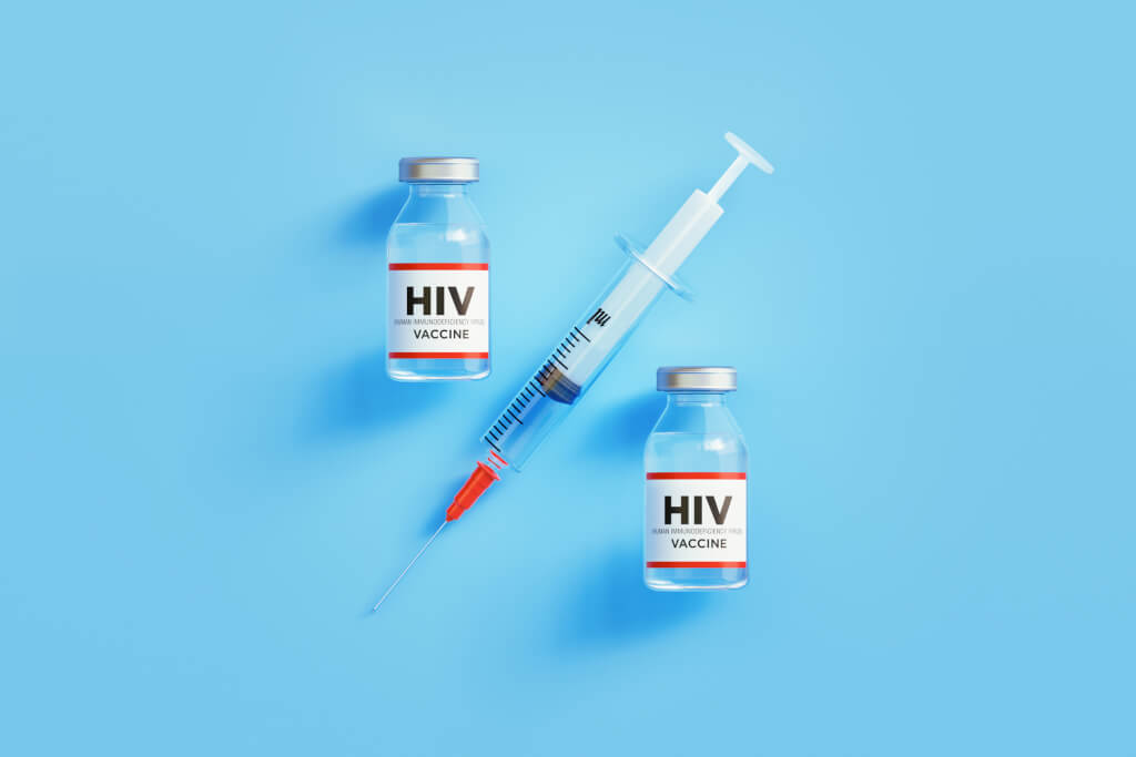 HIV vaccines and syringe forming percentage sign on blue background, Horizontal composition with copy space. Vaccine efficacy concept.