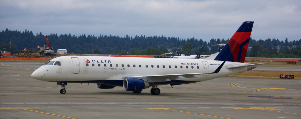 Delta Air Lines plane taxiing upon arrival in Seattle Washington